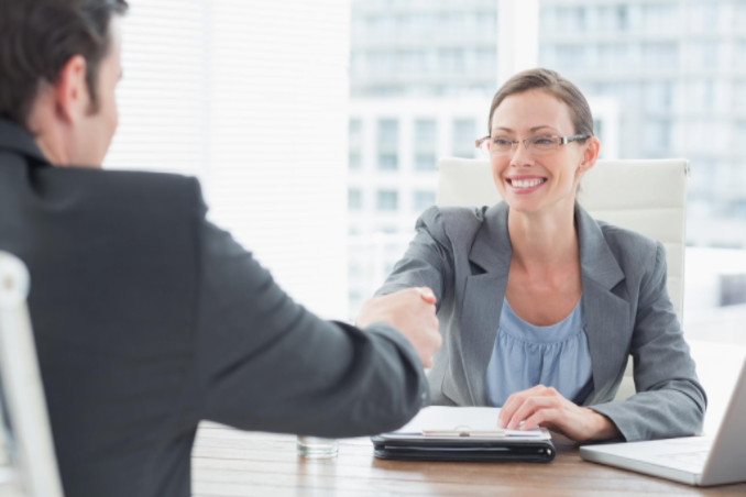 Lawyer shaking client’s hand: LawteryX Personal Injury and Accidents