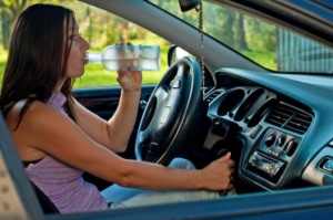 Woman drinking alcohol while driving: LawteryX Traffic, DUI/DWI Blog