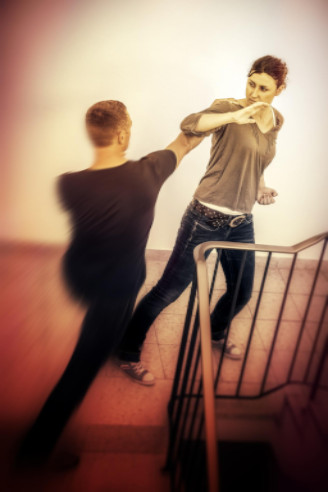 a woman acting in self defense