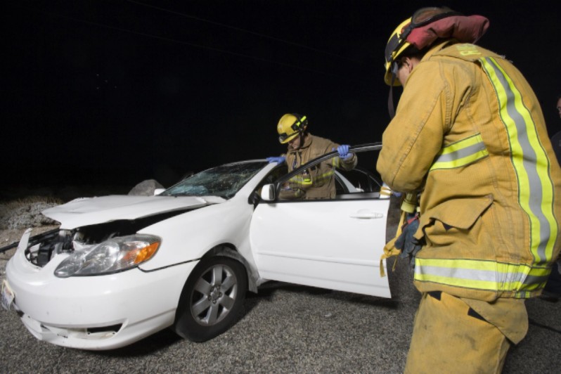 firefighters at car accident scene