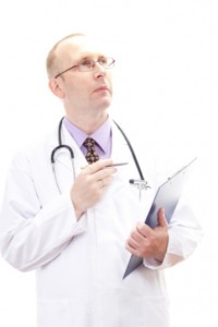 Doctor with clipboard looking at chart: Guides Healthcare-e General Health Blog