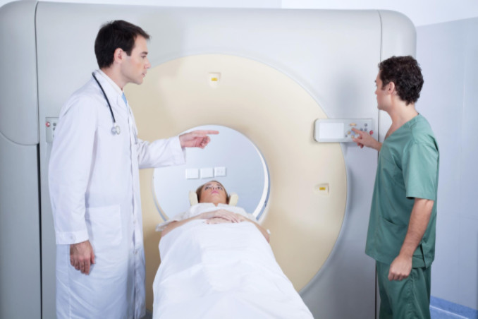 Doctors administering MRI: LawteryX Workers’ Compensation and Employment Law Blog