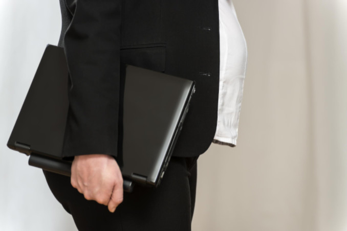 Pregnant businesswoman: LawteryX Employment Law Blog