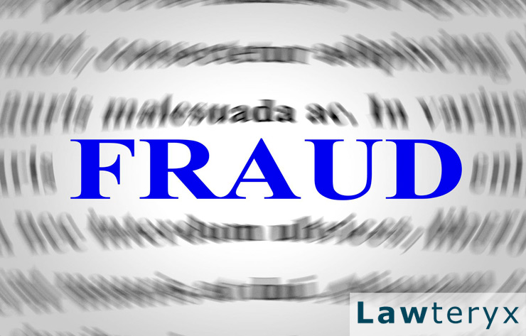 the word “fraud” in large blue typeset against a blurred background